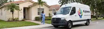 Doctor conducting an in-home primary care visit with an elderly patient